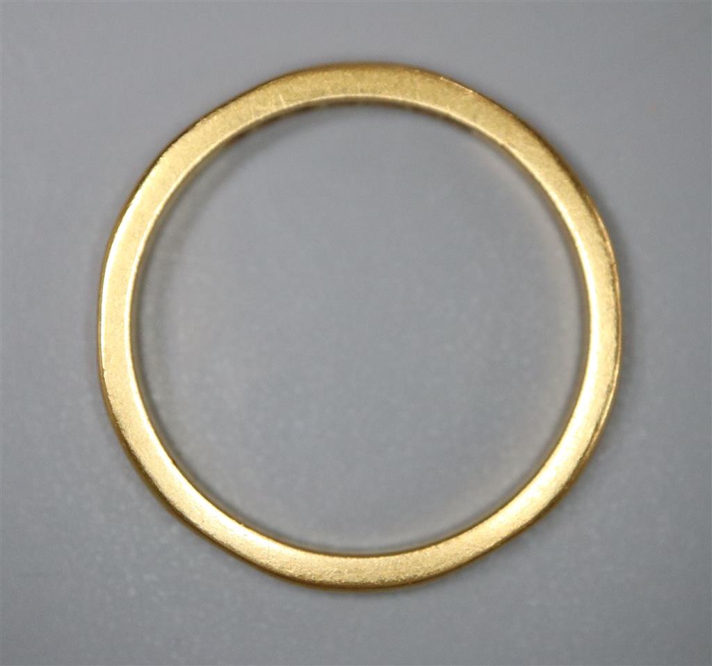 A 22ct gold wedding band, size K, 2.4 grams.